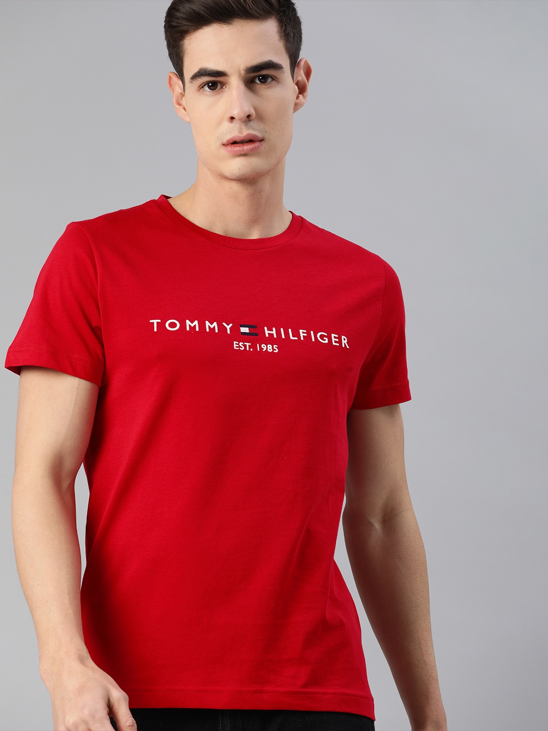 

Tommy Hilfiger Men Red Solid Round Neck Organic Cotton T-shirt with Logo