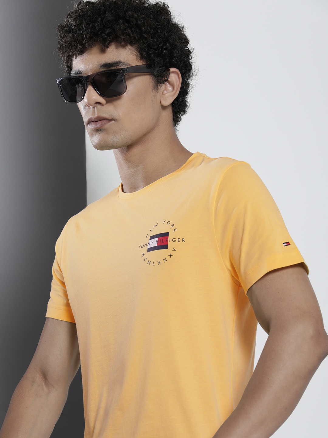 

Tommy Hilfiger Men Yellow Brand Logo Printed Pure Cotton T-shirt