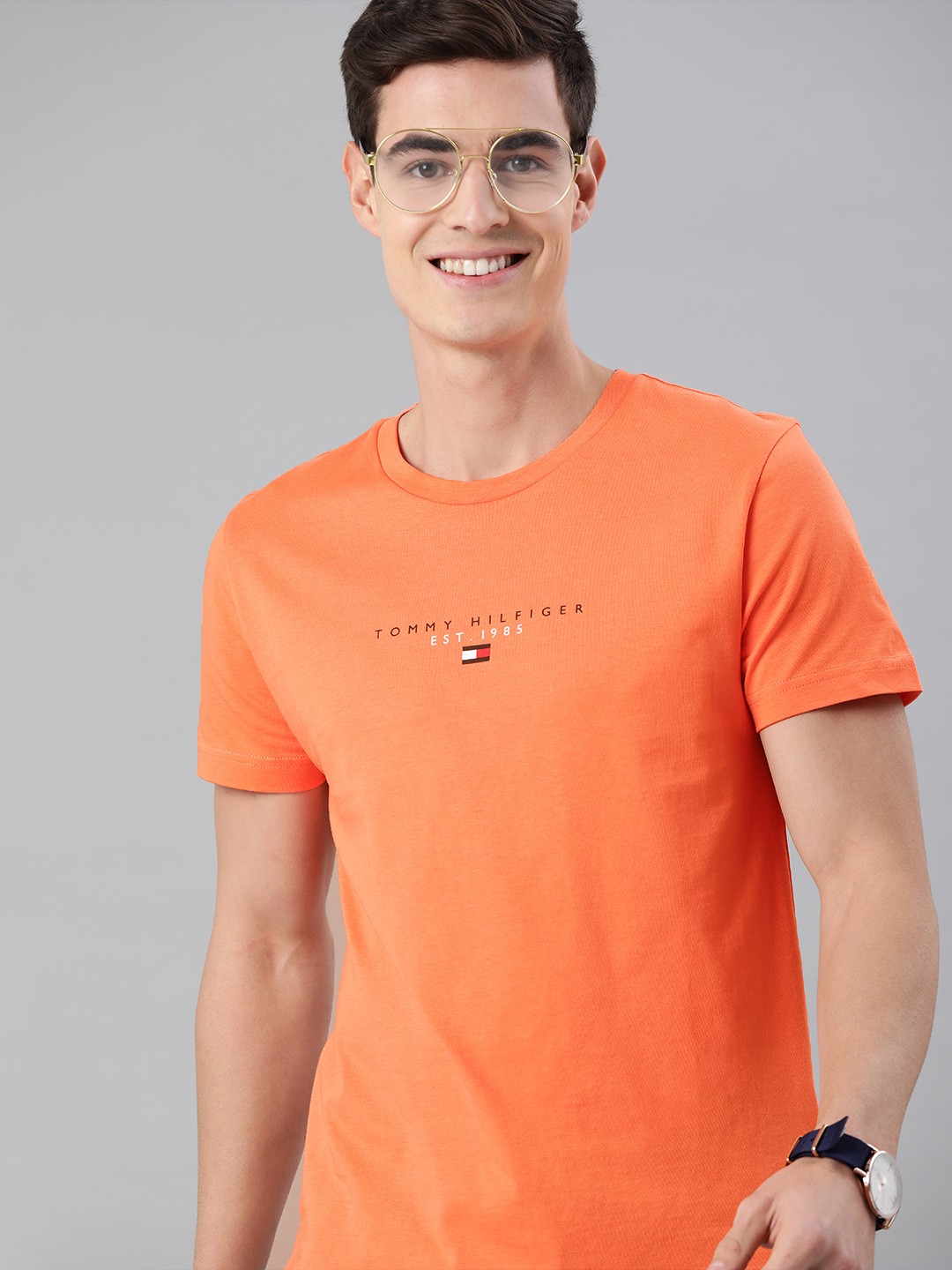 

Tommy Hilfiger Men Orange Solid ESSENTIAL Pure Round Neck Organic Cotton T-shirt