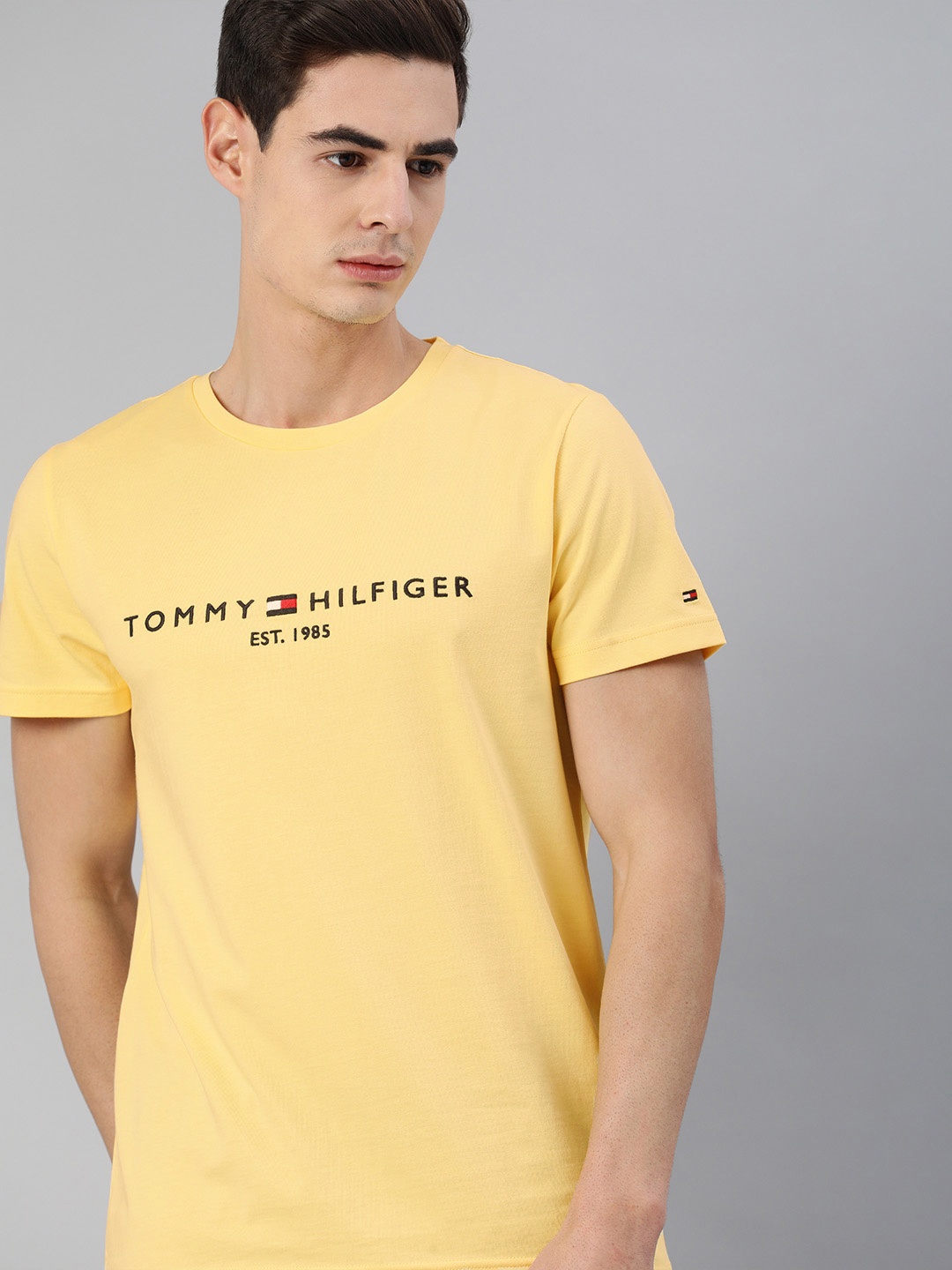 

Tommy Hilfiger Men Yellow Logo Printed Round Neck Organic Cotton T-shirt