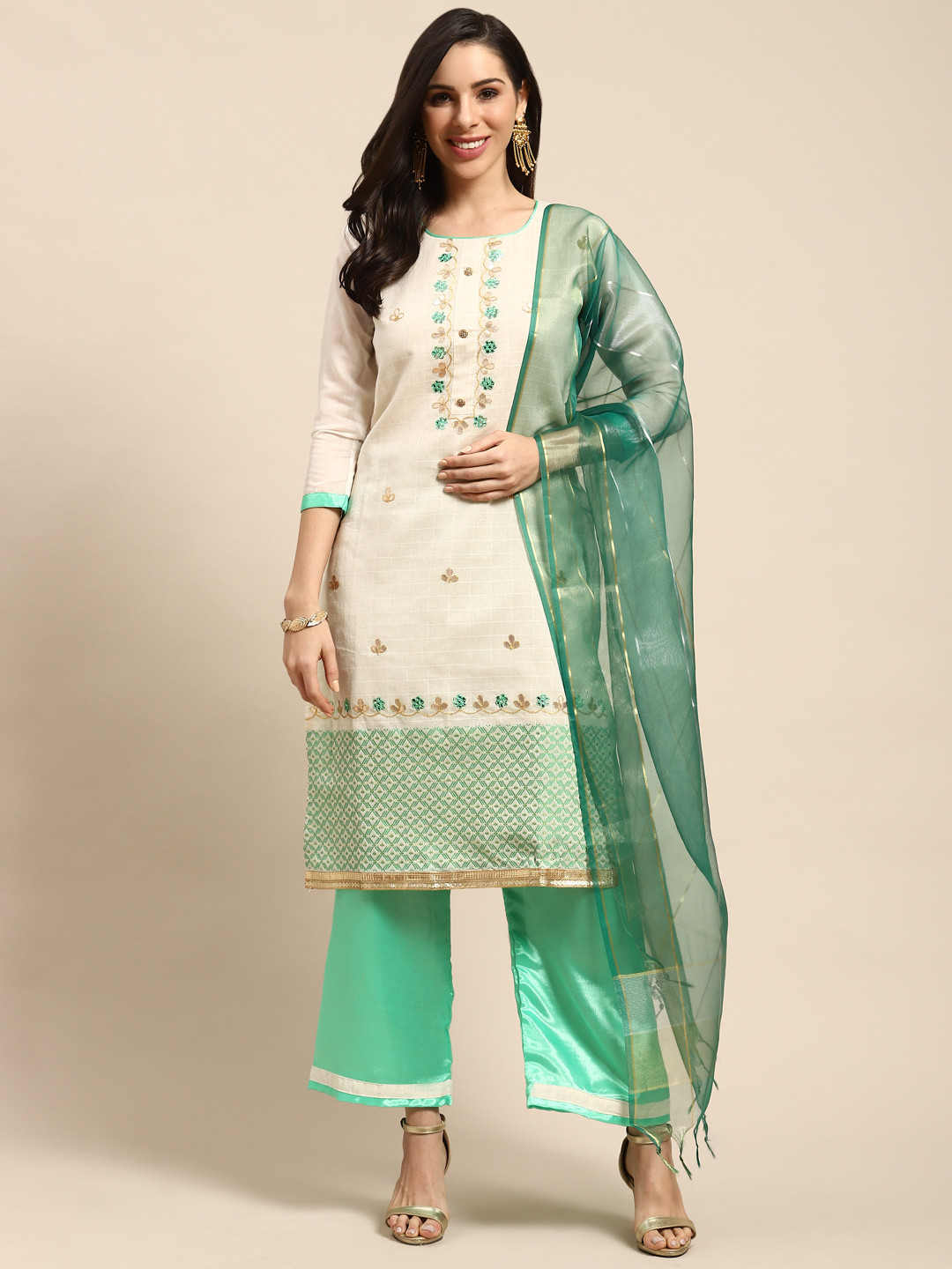 

Rajnandini Beige & Green Embroidered Semi-Stitched Dress Material