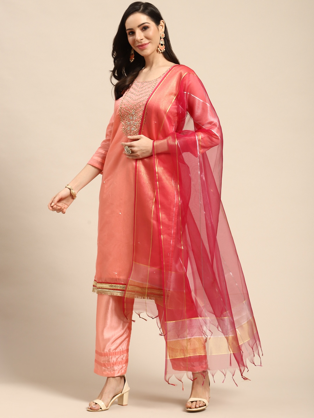 

Rajnandini Peach-Coloured & Golden Yoke Design Semi-Stitched Dress Material