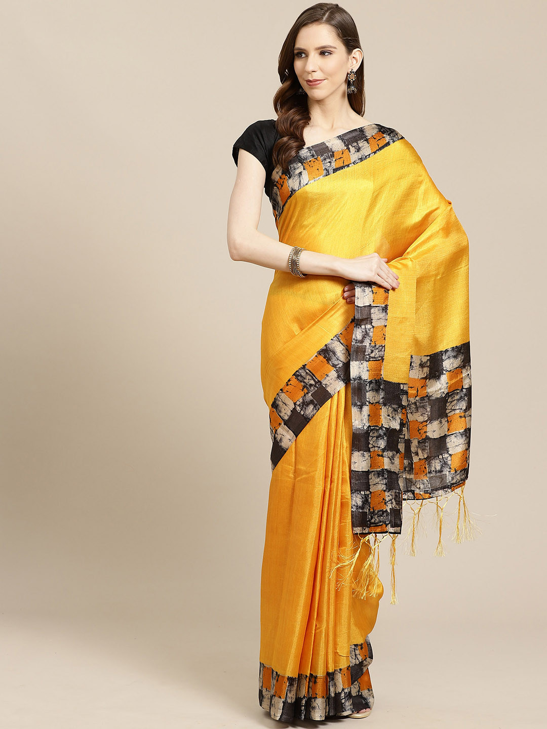 

Rajnandini Mustard Yellow Solid Saree