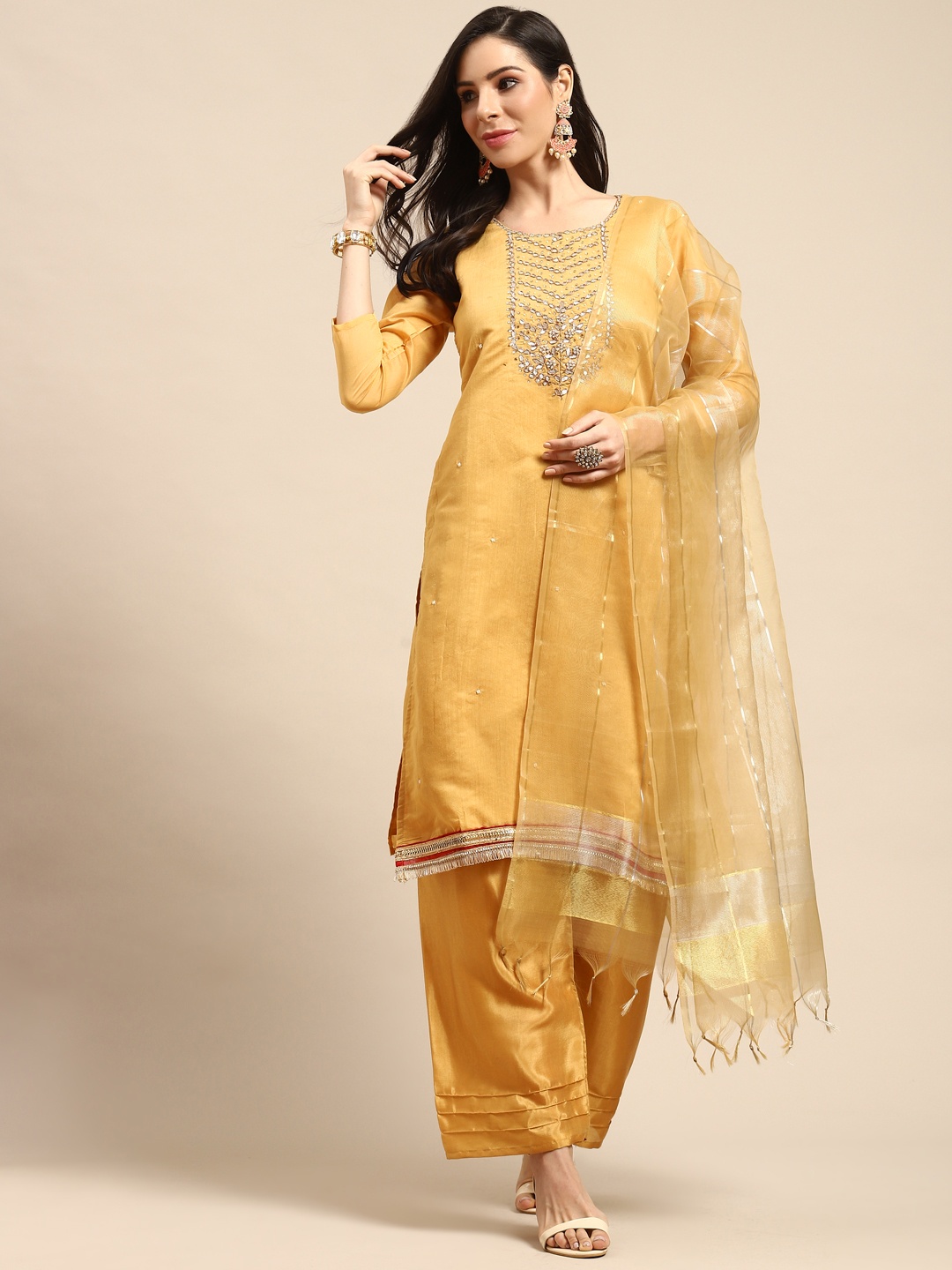 

Rajnandini Yellow & Golden Yoke Design Semi-Stitched Dress Material
