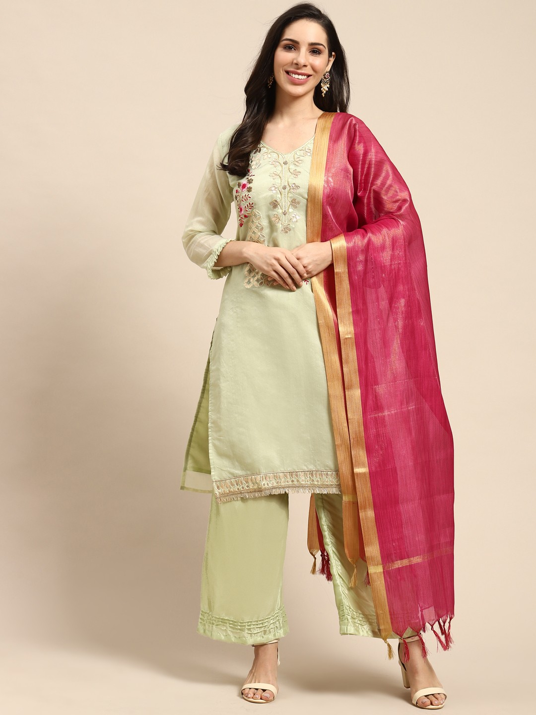 

Rajnandini Green & Golden Embroiered Semi Stitched Dress Material