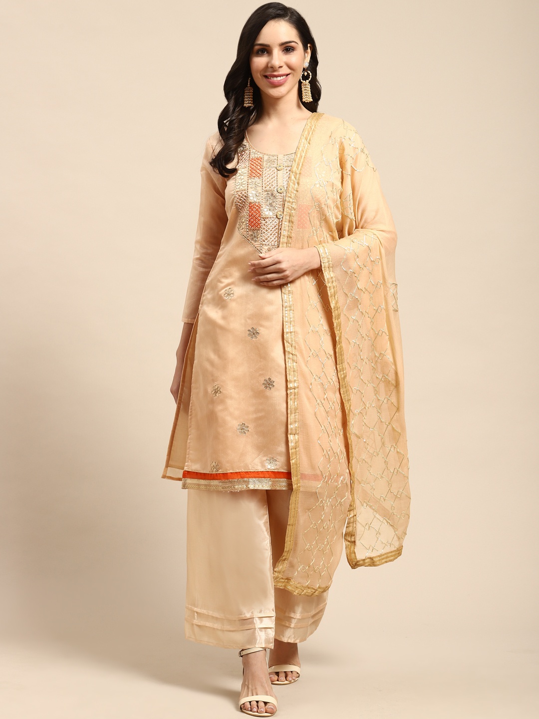 

Rajnandini Beige & Peach-Coloured Embroidered Semi-Stitched Dress Material