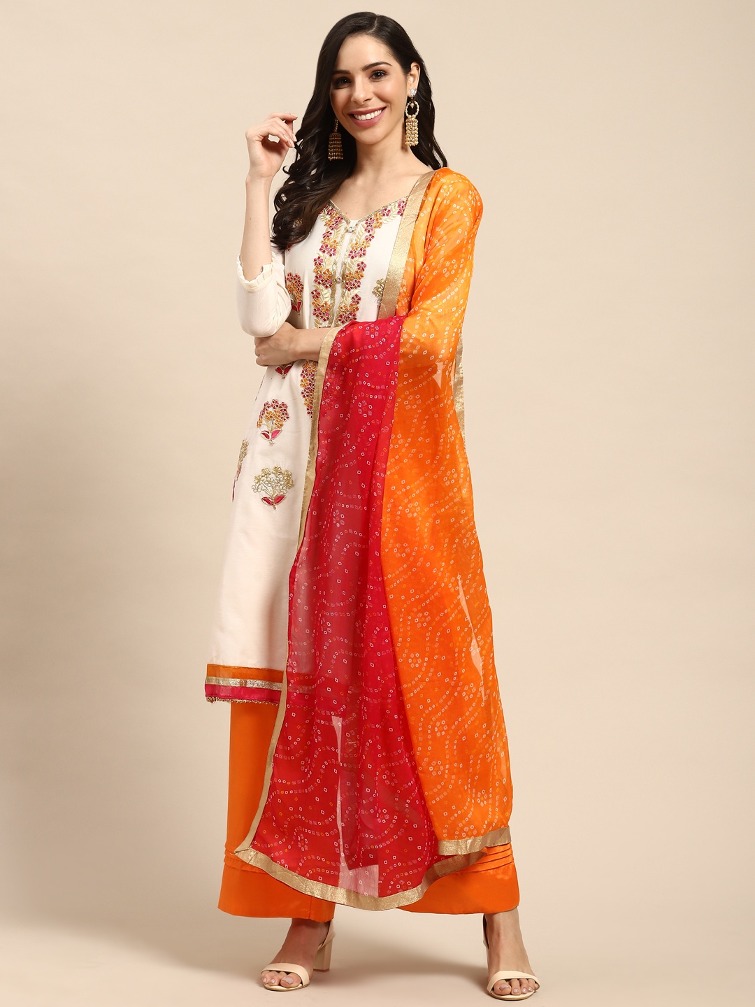 

Rajnandini Off-White & Pink Embroidered Semi-Stitched Dress Material