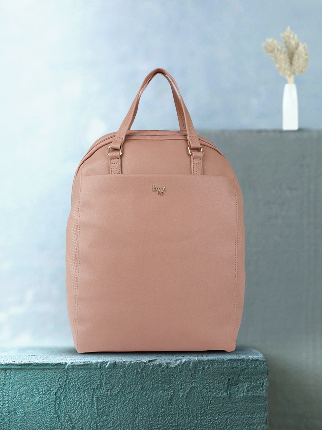 

Baggit Dusty Pink Solid Handheld Laptop Bag