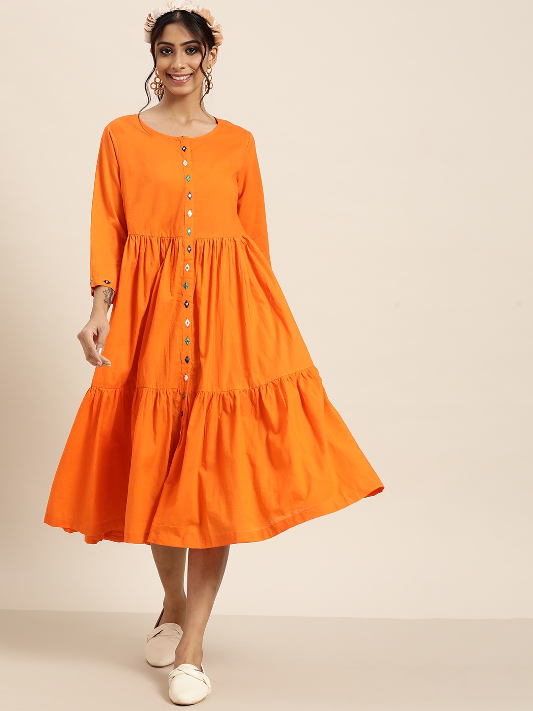 

Sangria Women Orange Solid Pure Cotton Tiered Fit and Flare Dress with Mirror Work