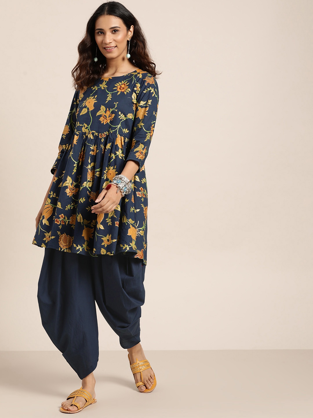 

Sangria Women Navy Blue & Mustard Yellow Floral Panelled Pure Cotton Kurta with Salwar