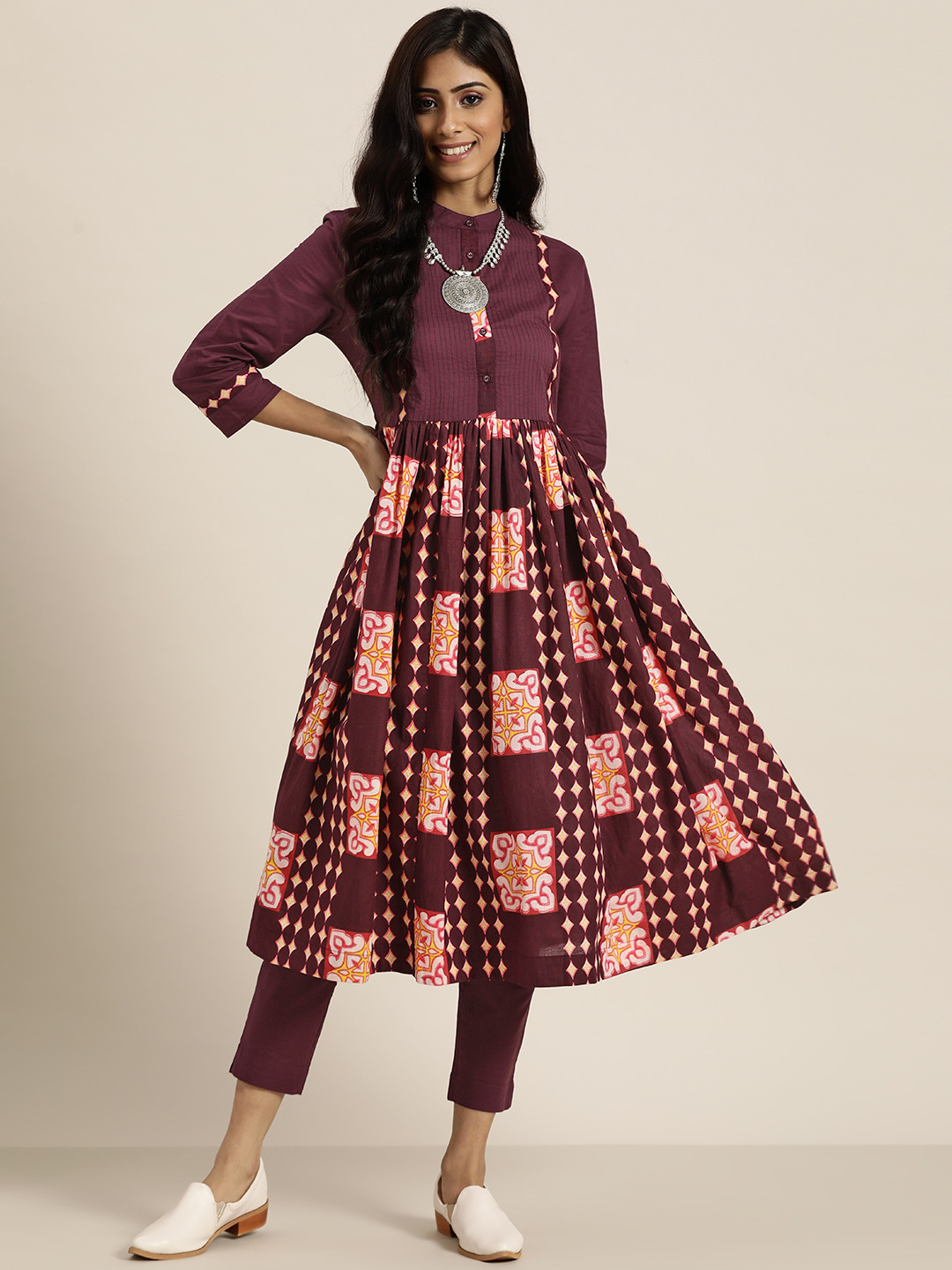 

Sangria Women Burgundy & White Motifs Print Cotton Gathered A-line Kurta with Trousers