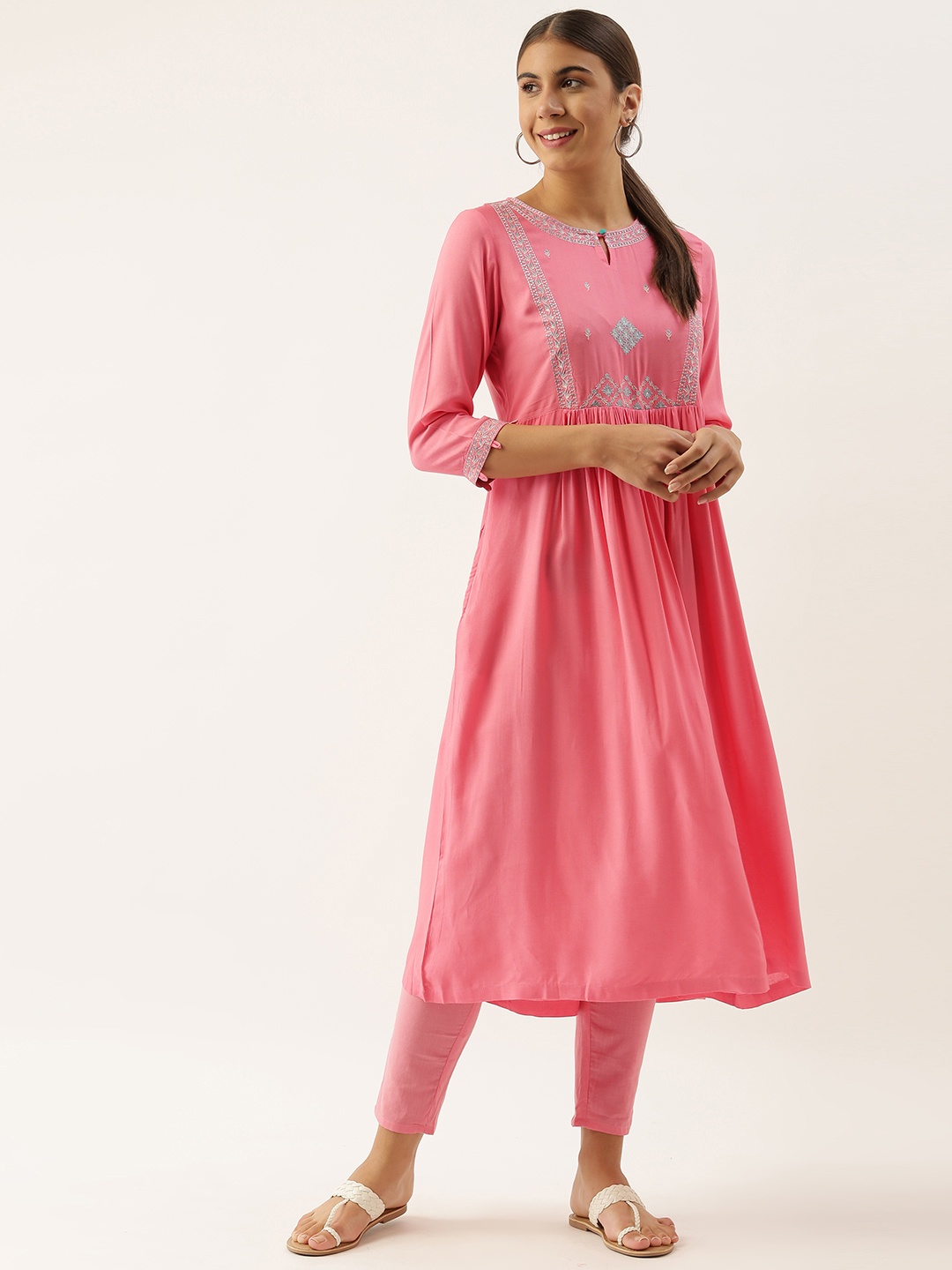 

Sangria Women Pink Ethnic Motifs Yoke Design Kurta with Trousers