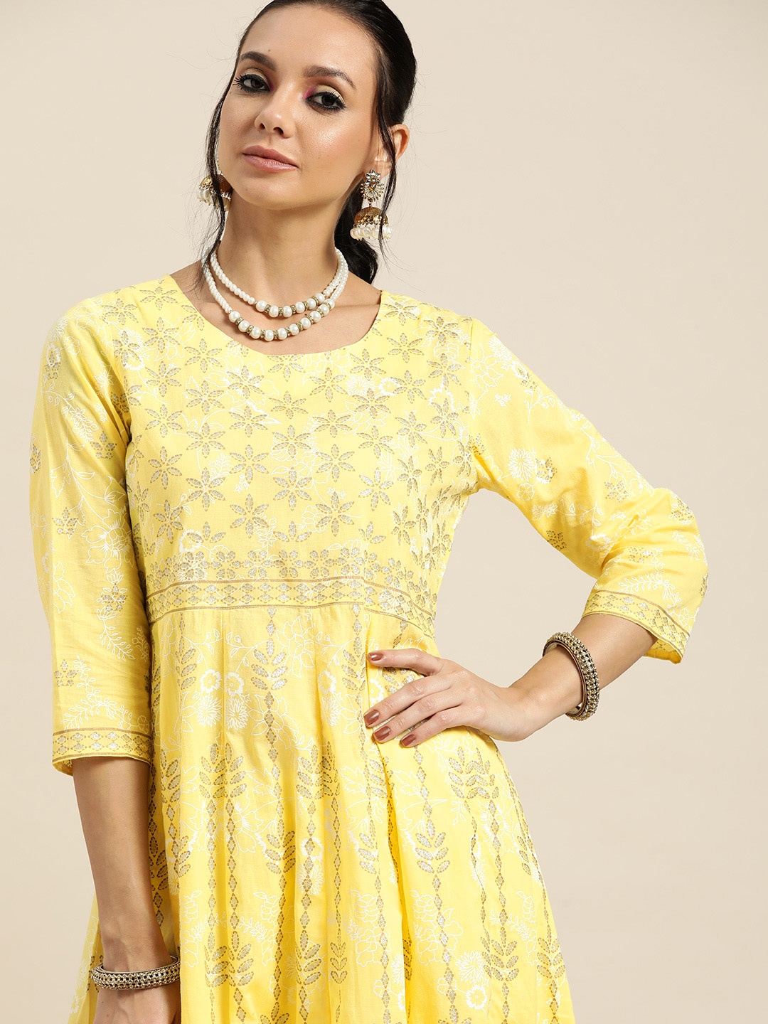 

Sangria Women Yellow & Silver Ethnic Motifs Print Cotton Anarkali Panelled Kurta