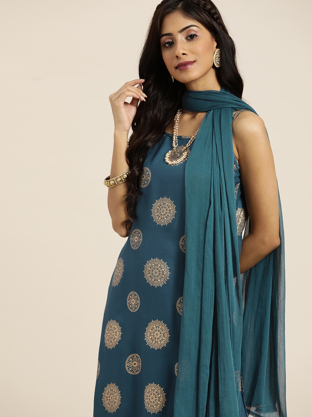 

Sangria Women Teal Blue Ethnic Motifs Print Straight Kurta with Trousers & Dupatta