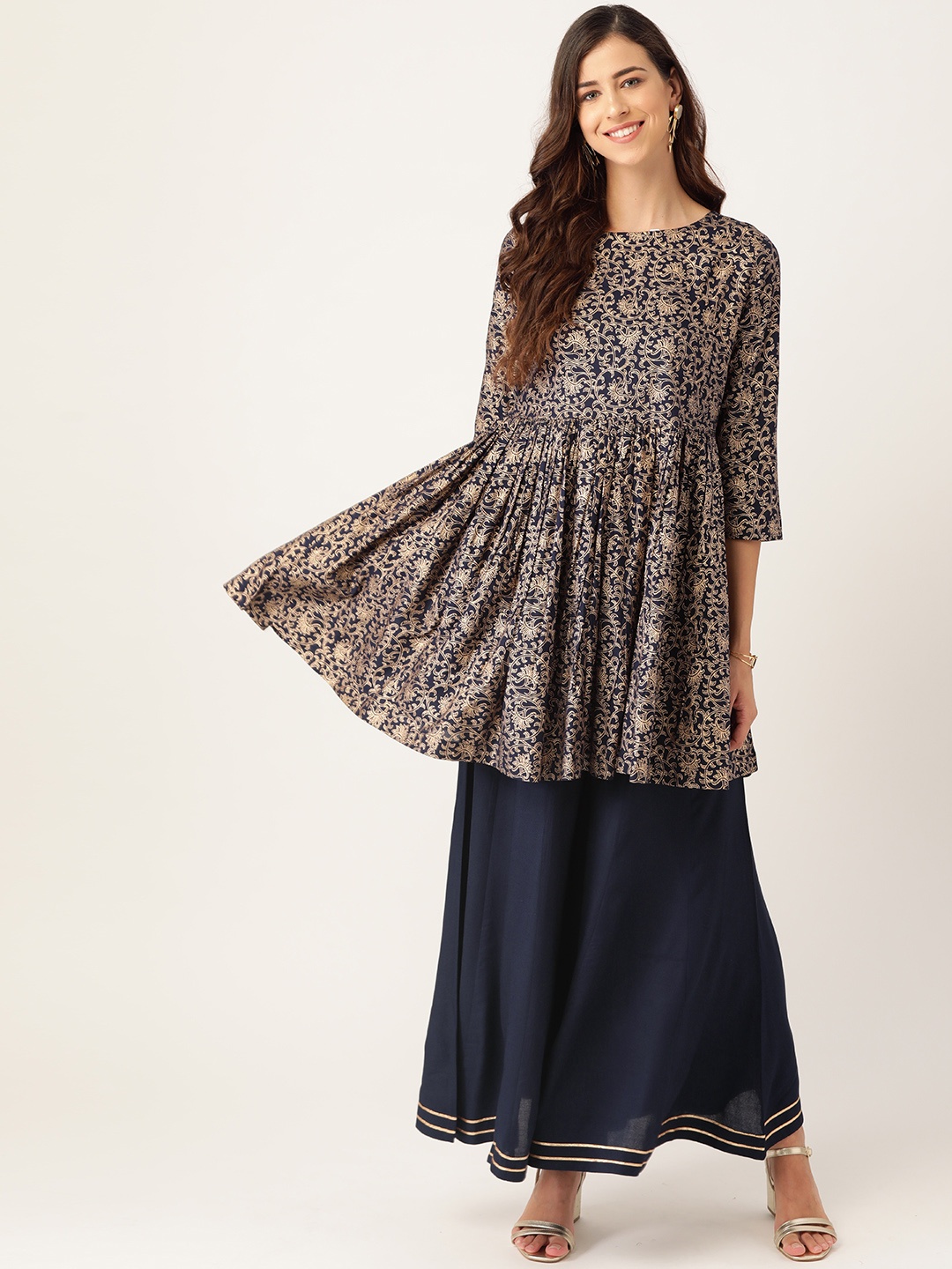 

Sangria Women Navy Blue & Golden Ethnic Motifs Printed Kurta with Palazzos