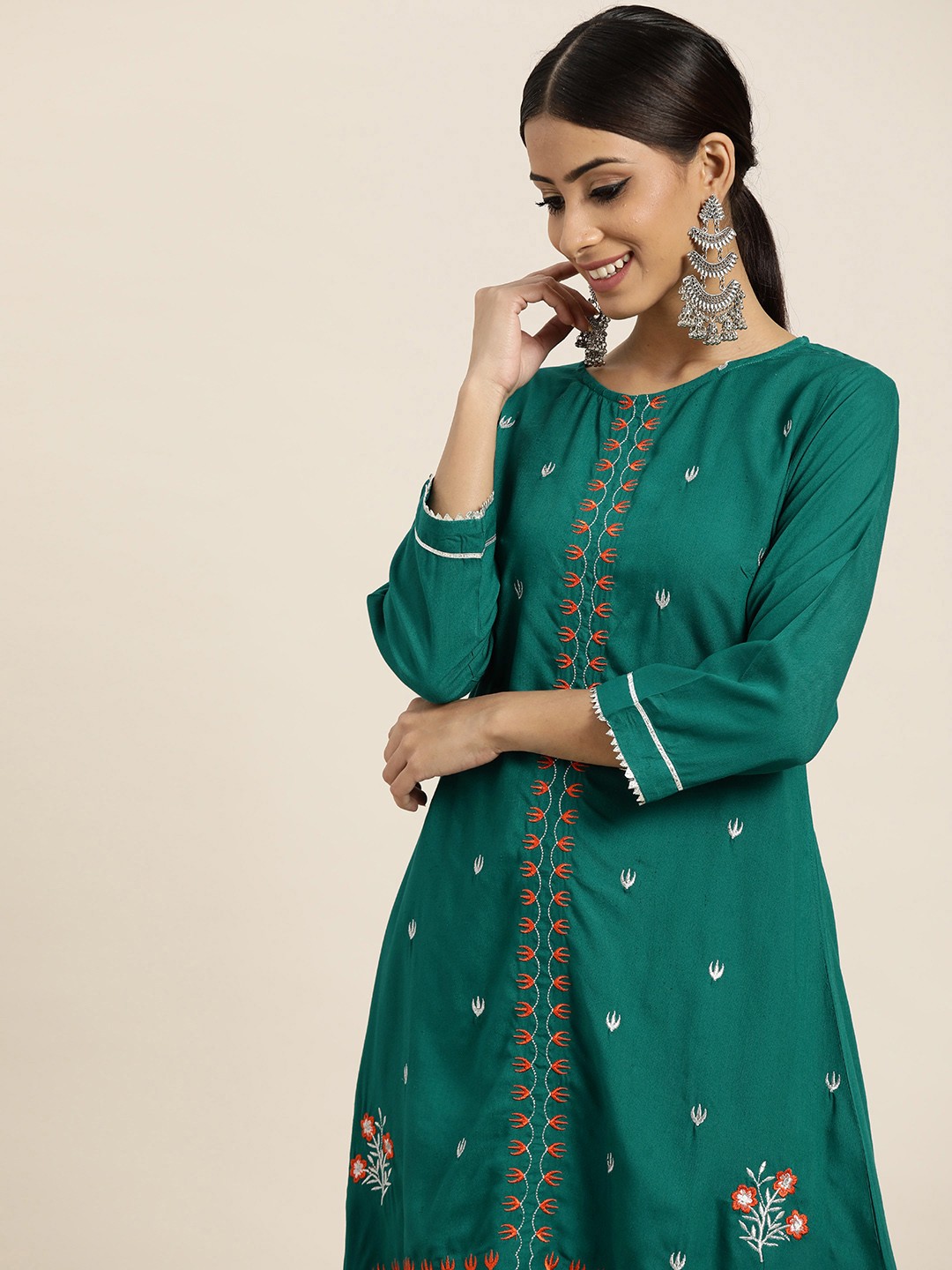 

Sangria Women Green & White Ethnic Motifs Embroidered A-line Kurta with Dhoti Pants