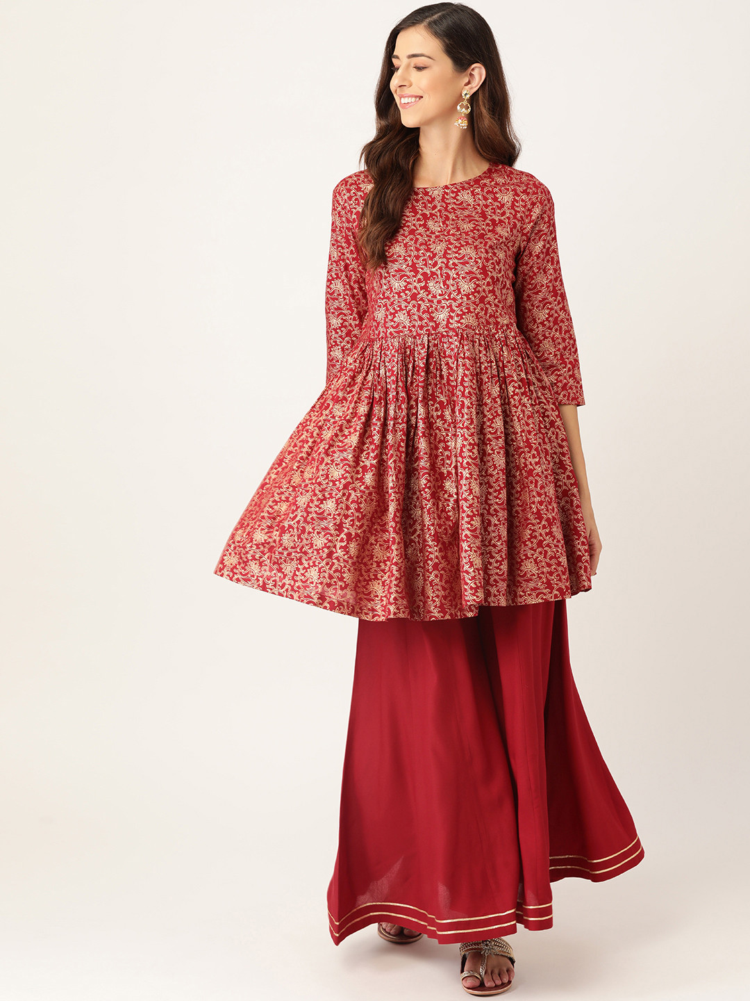 

Sangria Women Maroon & Off White Ethnic Motifs Print Gathered Kurta with Palazzos