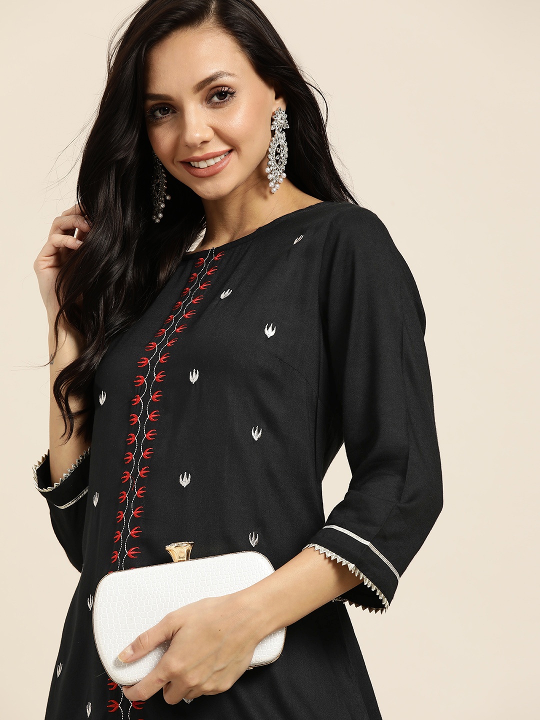 

Sangria Women Black Ethnic Motifs Embroidered Gotta Patti Kurta with Dhoti Pants