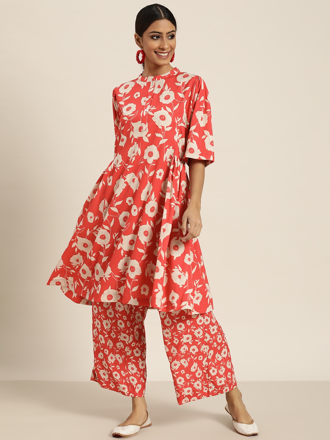 

Sangria Women Red & Beige Floral Print Kurta & Palazzos