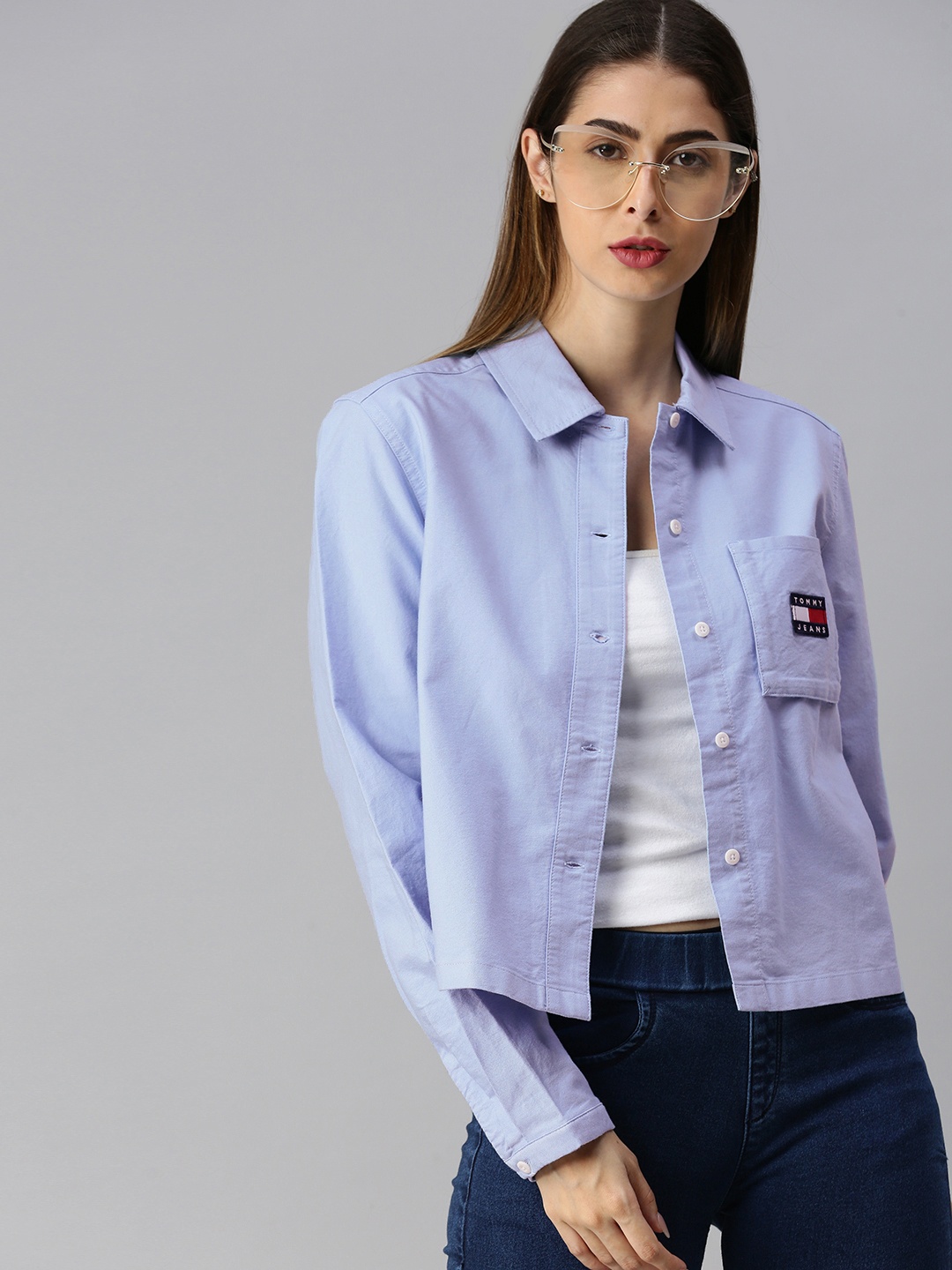 

Tommy Hilfiger Women Blue Regular Fit Solid Casual Crop Shirt with Applique Detail