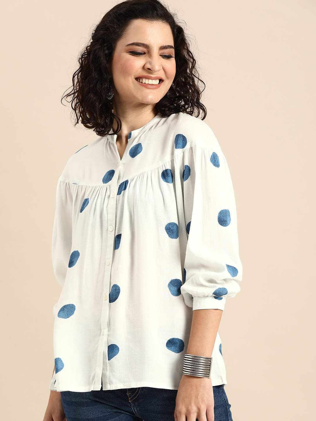 

Varanga Women White & Blue Printed Tunic