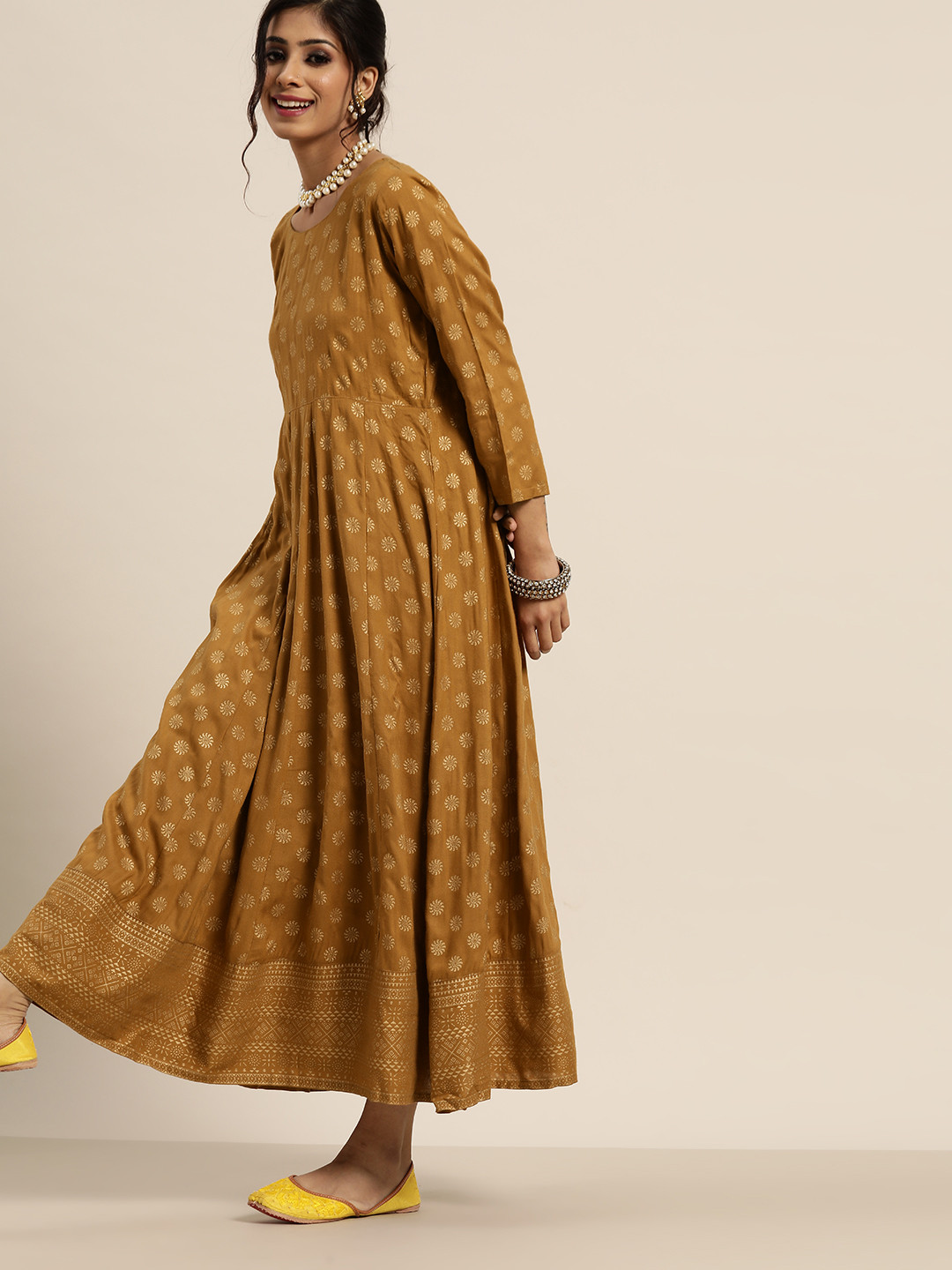 

Shae by SASSAFRAS Women Brown & Golden Printed Maxi Dress