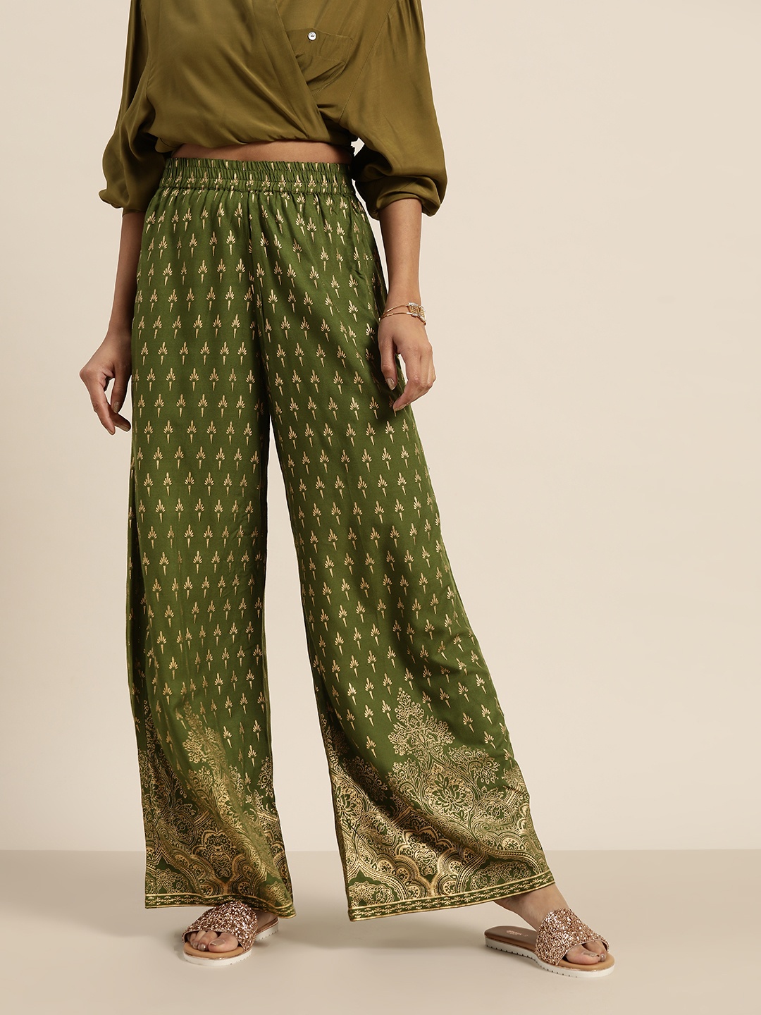 

Shae by SASSAFRAS Women Olive Green & Golden Foil Printed Wide Leg Palazzos