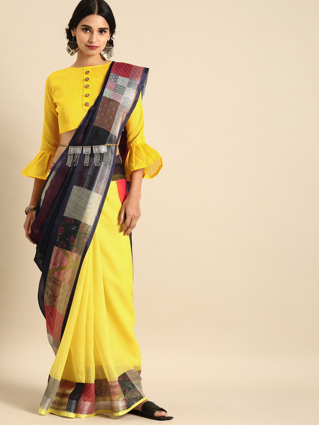 

Sangria Mustard Yellow Solid Pure Linen Saree