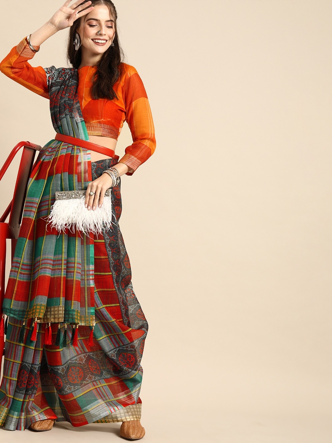

Sangria Rust Red & Green Pure Linen Checked Saree
