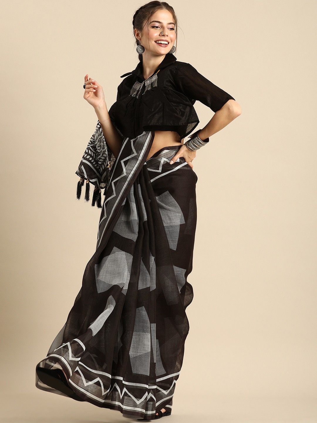 

Sangria Black Printed Pure Linen Saree