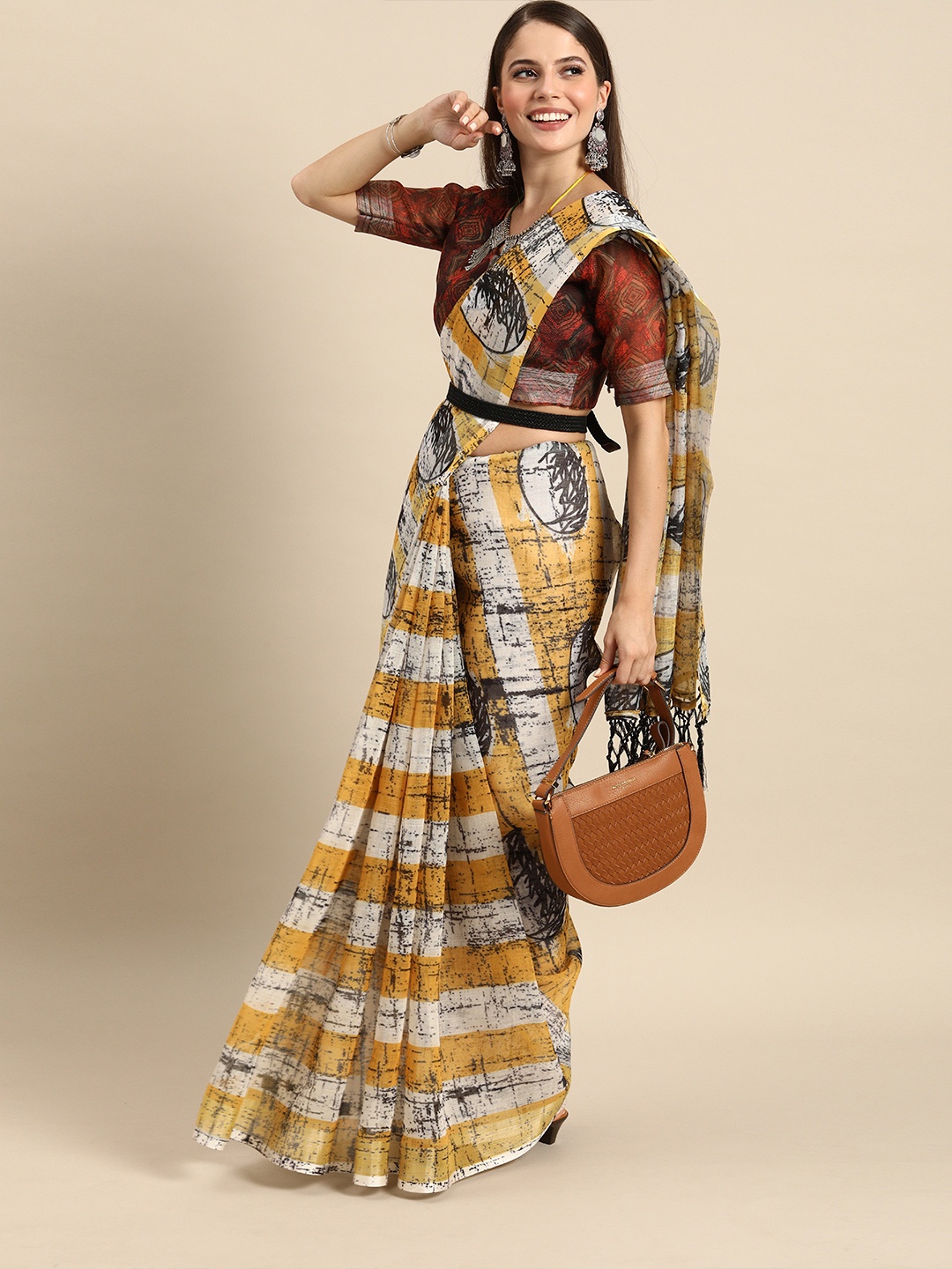 

Sangria Mustard Yellow & White Pure Linen Tie & Dyed Saree