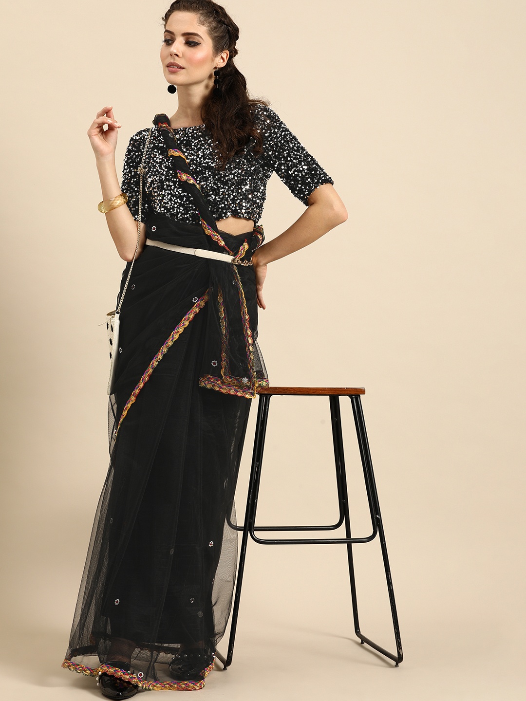 

Sangria Black Embellished Net Saree