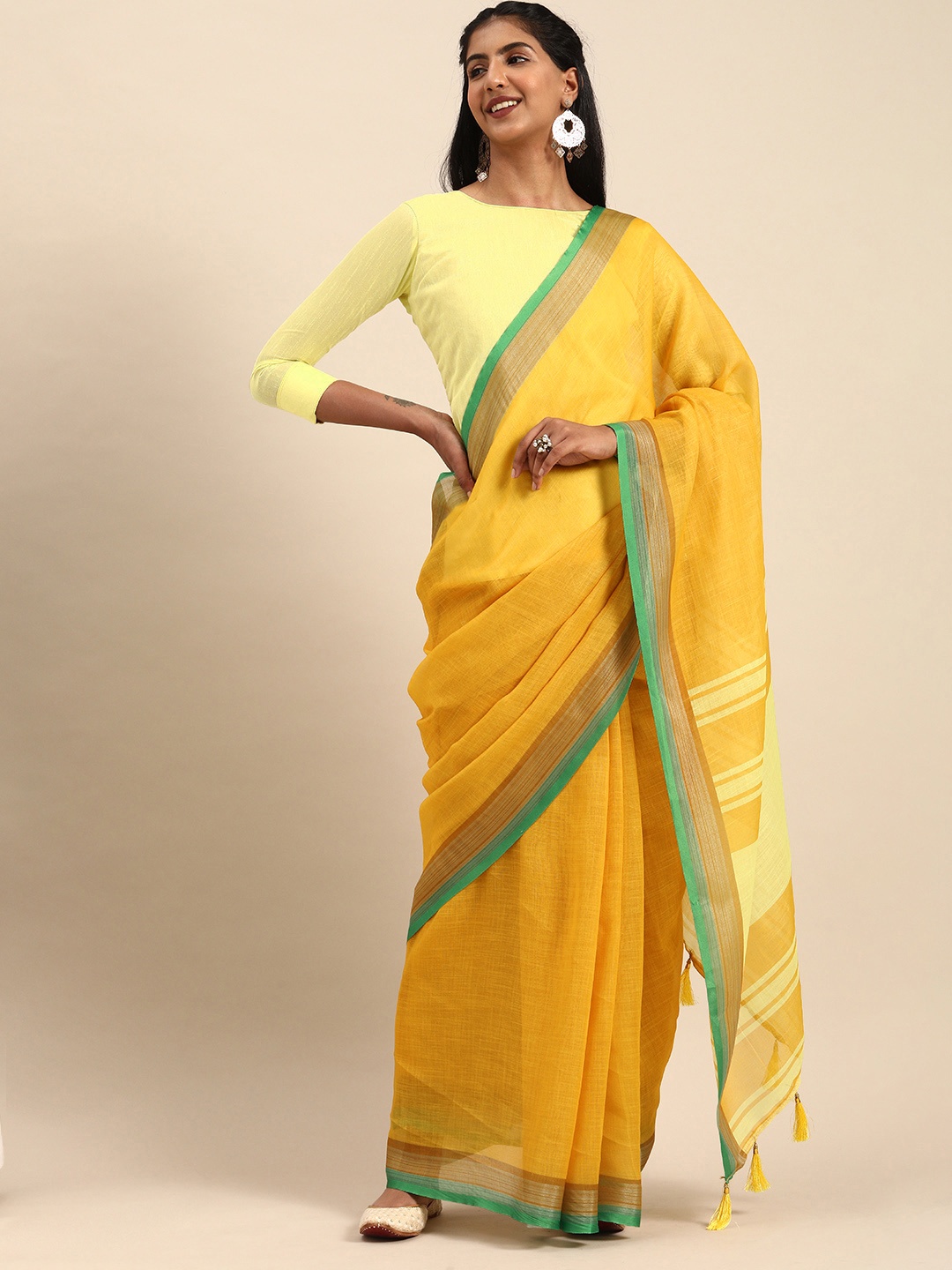 

Sangria Mustard Yellow Solid Pure Linen Saree