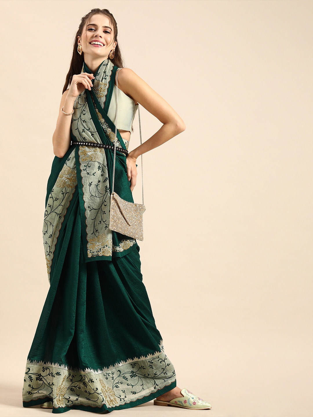 

Sangria Green Solid Silk Blend Saree with Embroidered Border