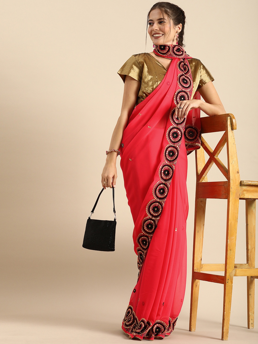 

Sangria Pink Embellished Pure Georgette Saree