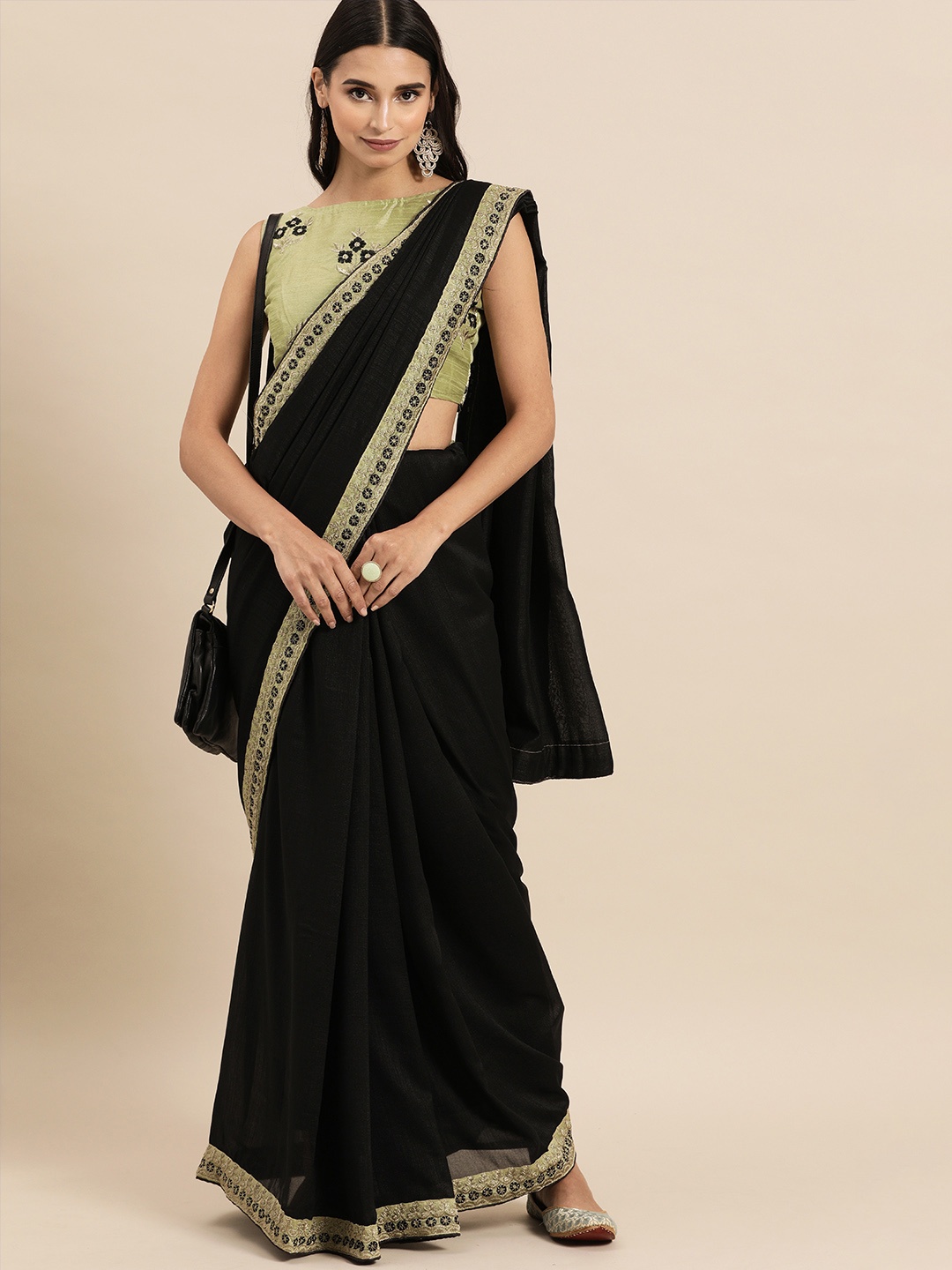 

Sangria Black Solid Silk Blend Saree