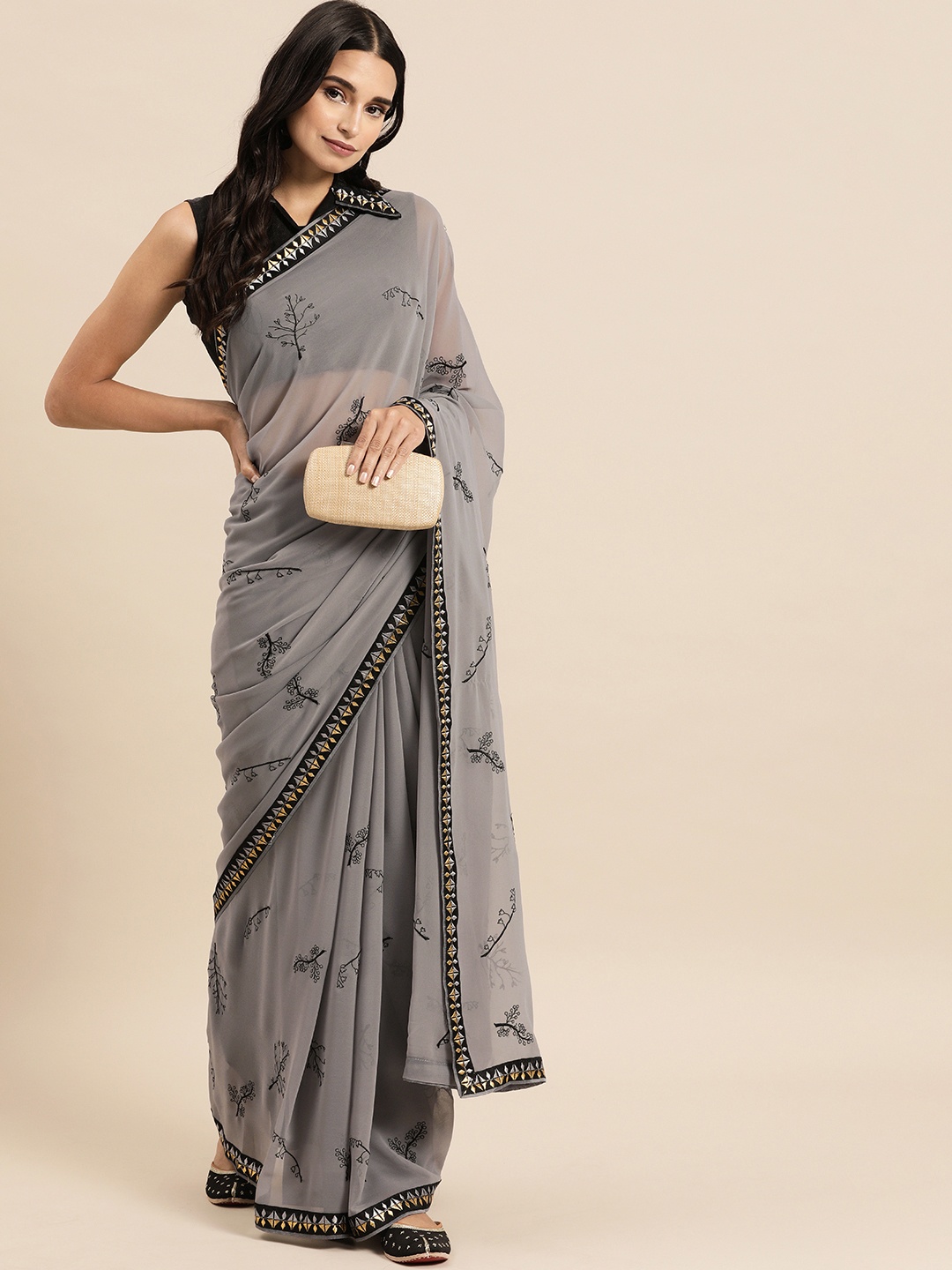 

Sangria Grey Embroidered Pure Georgette Saree