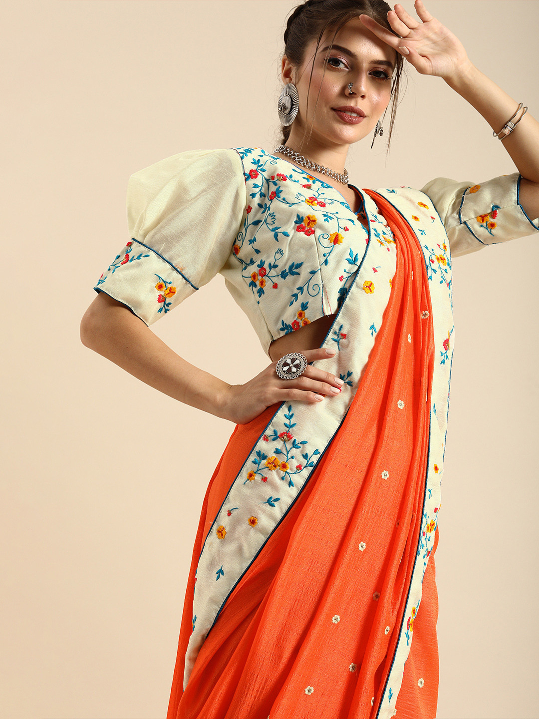 

Sangria Orange Embroidered Silk Blend Saree