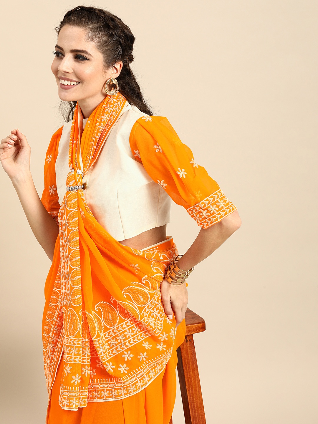 

Sangria Orange & White Pure Georgette Embroidered Saree
