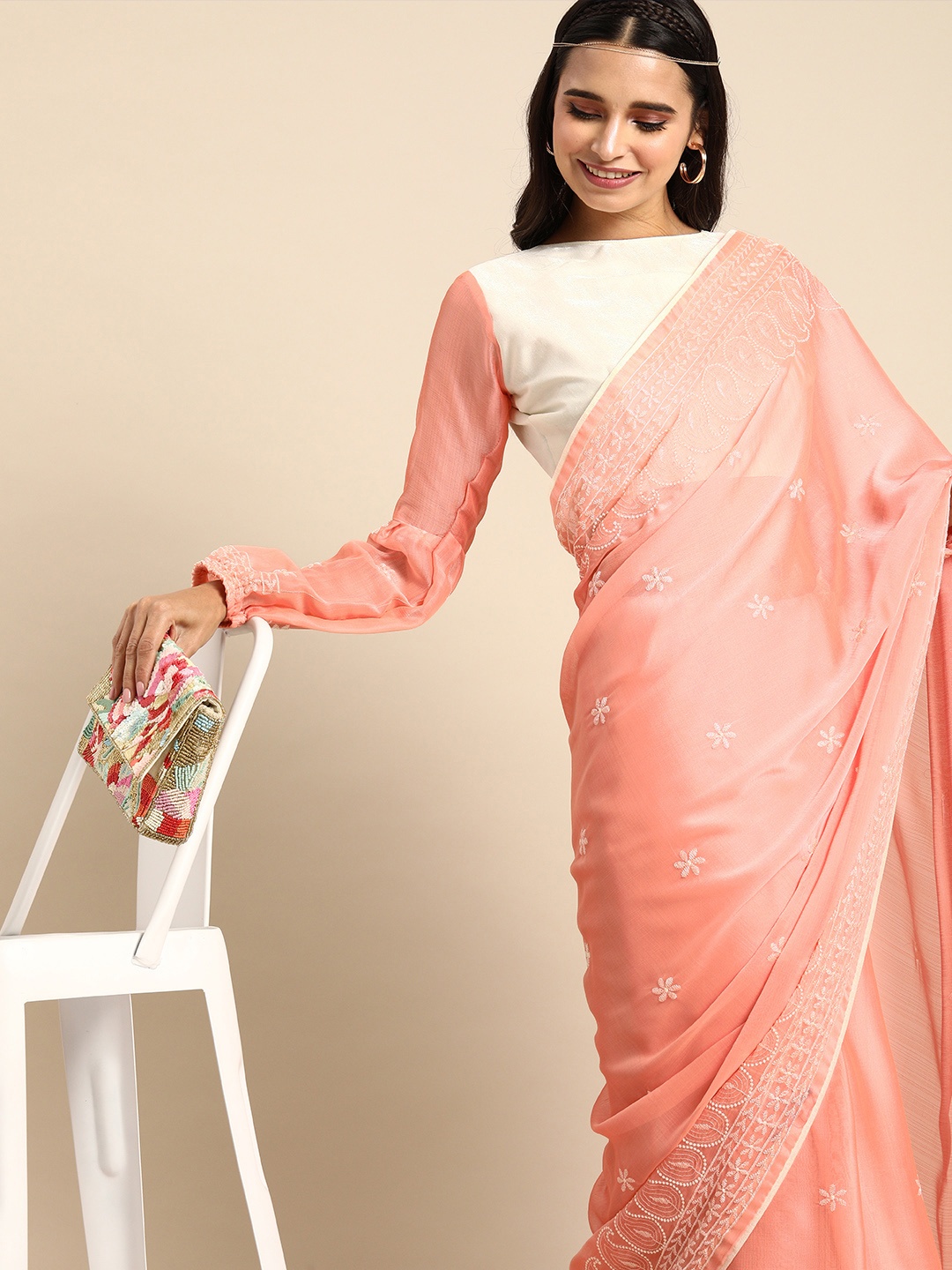 

Sangria Peach-Coloured Chikankari Pure Georgette Saree