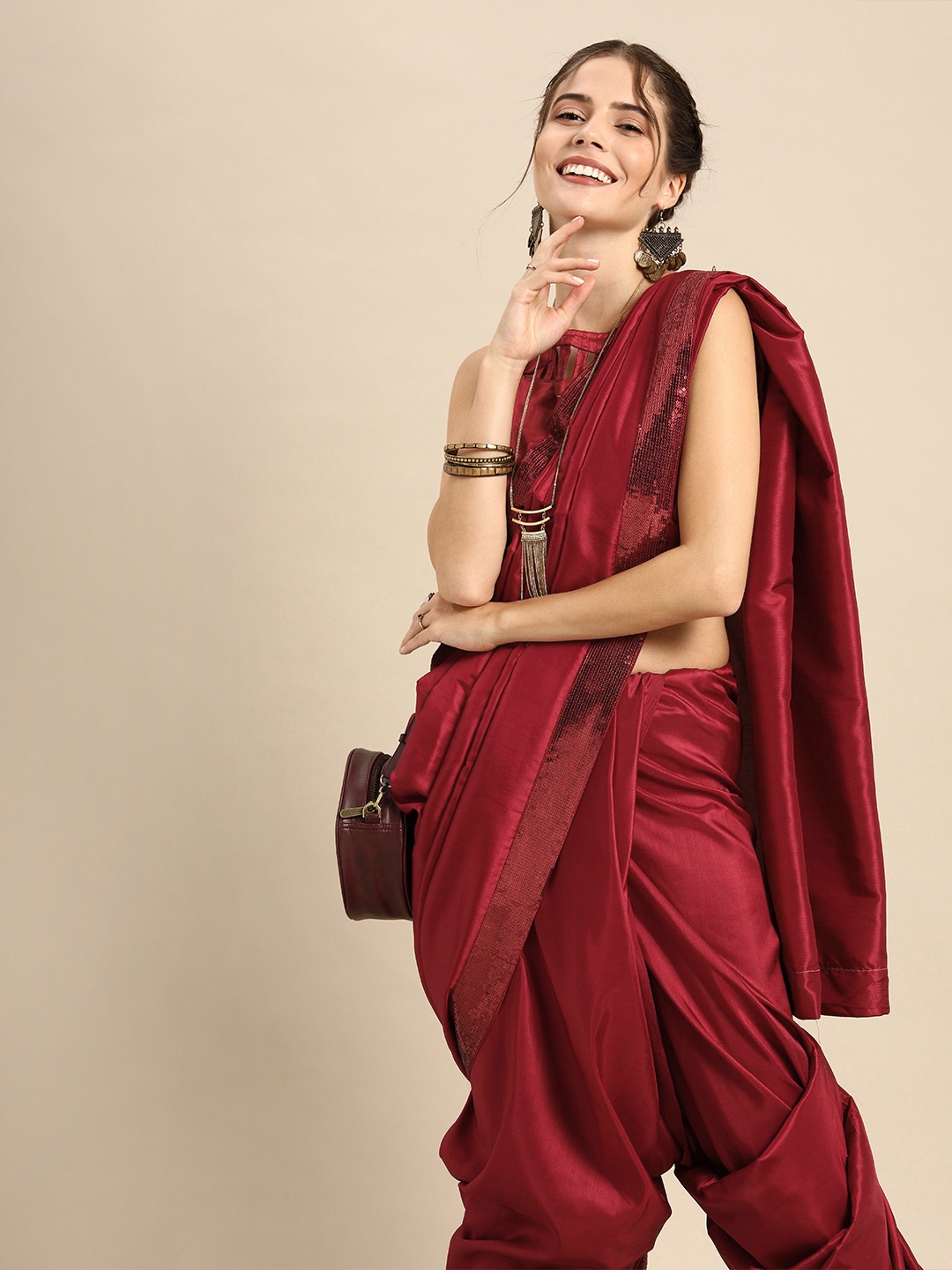 

Sangria Maroon Solid Silk Blend Saree