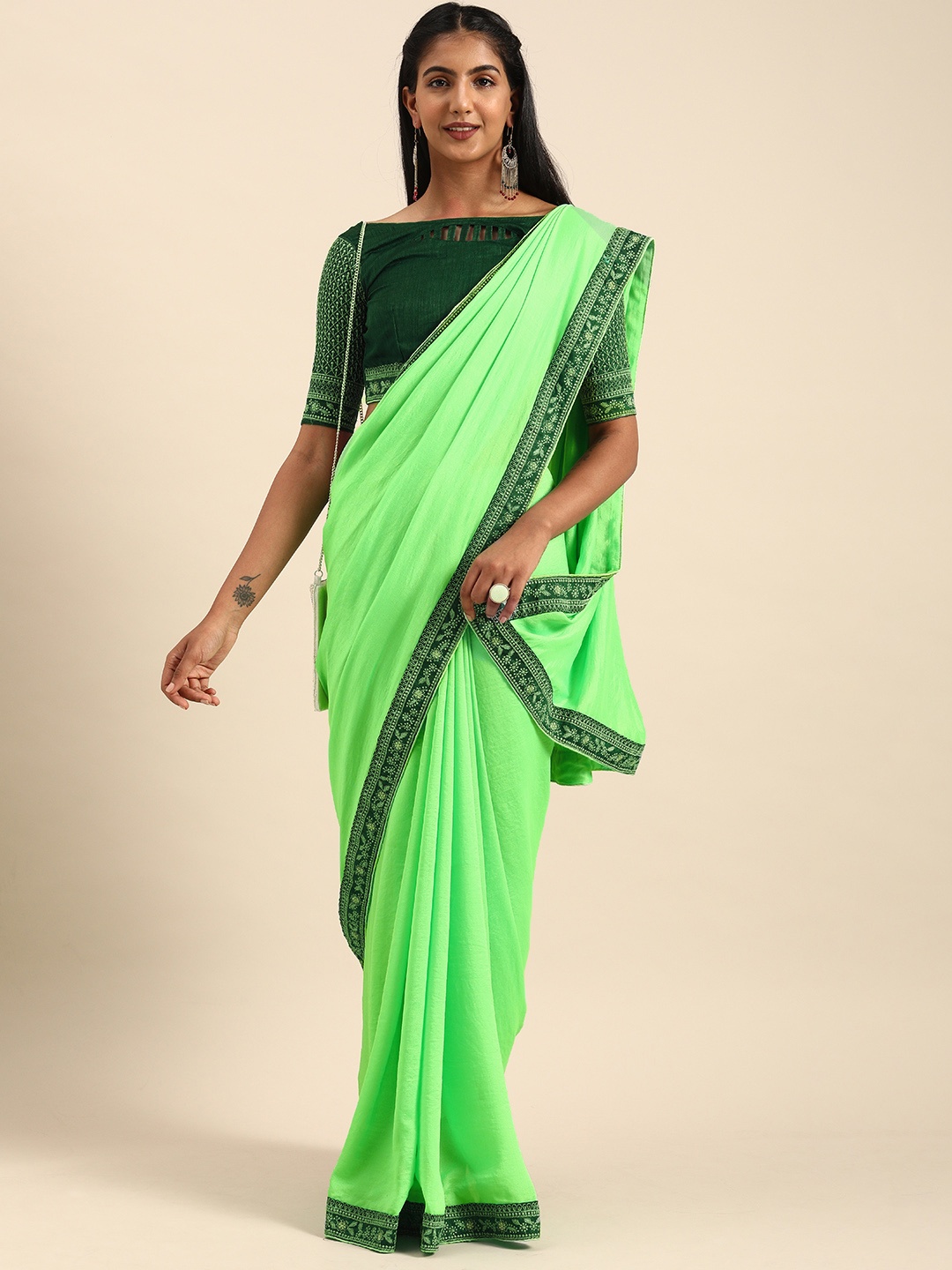 

Sangria Green Solid Silk Blend Saree