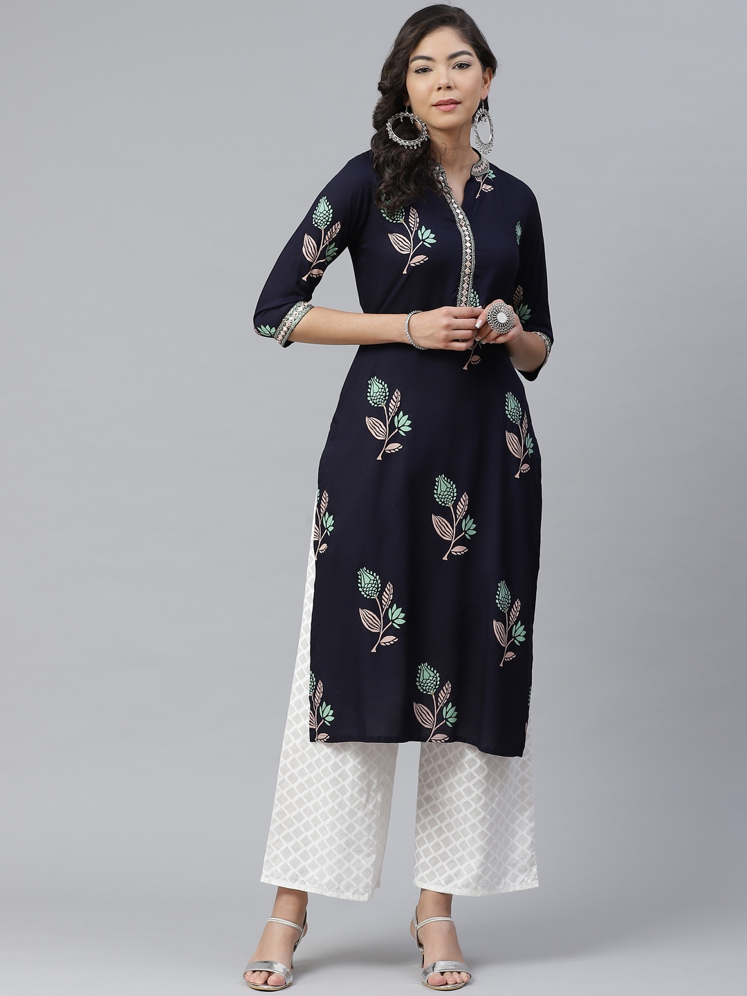 

Anubhutee Women Navy Blue & Green Embroidered Kurta with Palazzos