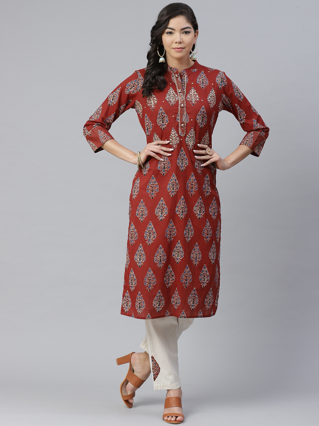 

Anubhutee Women Rust Brown & Blue Ethnic Motifs Printed Straight Kurta with Trousers