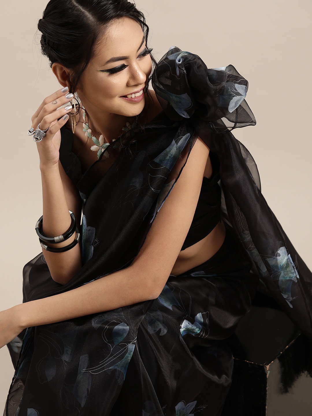 

Inddus Black & Blue Floral Printed Organza Saree