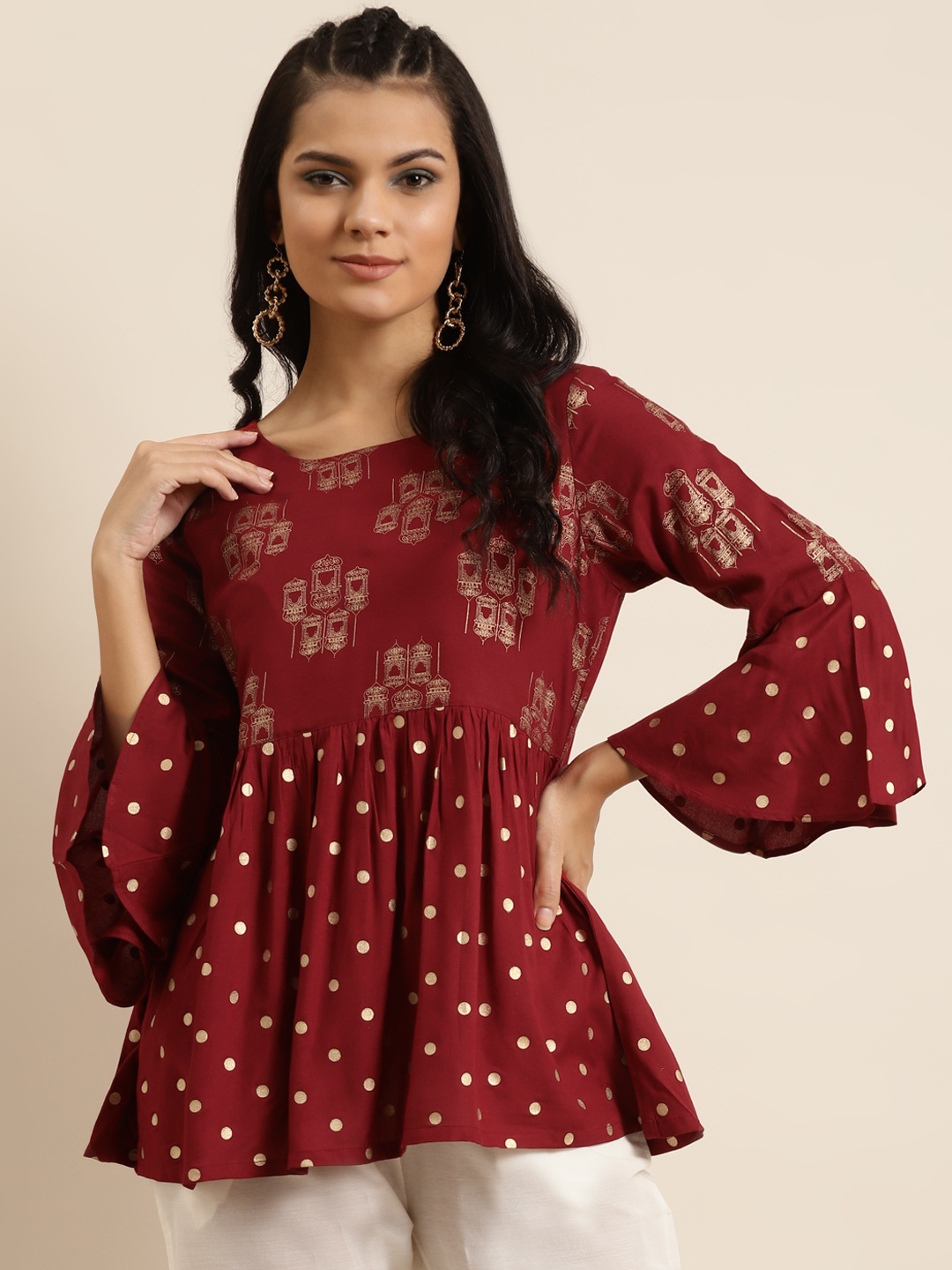 

Shae by SASSAFRAS Women Maroon & Golden Printed Liva A-line Top