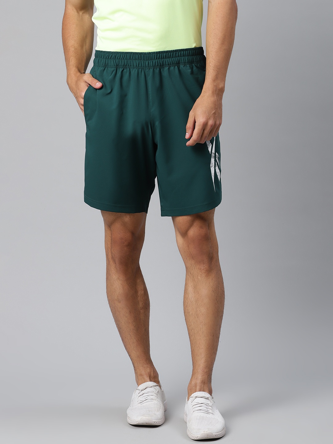 

Reebok Men Green Printed Workout Ready Graphic Shorts