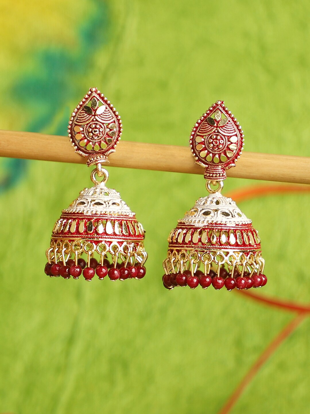 

ANIKAS CREATION Maroon & Gold-Toned Dome Shaped Traditional Enamelled Jhumkas