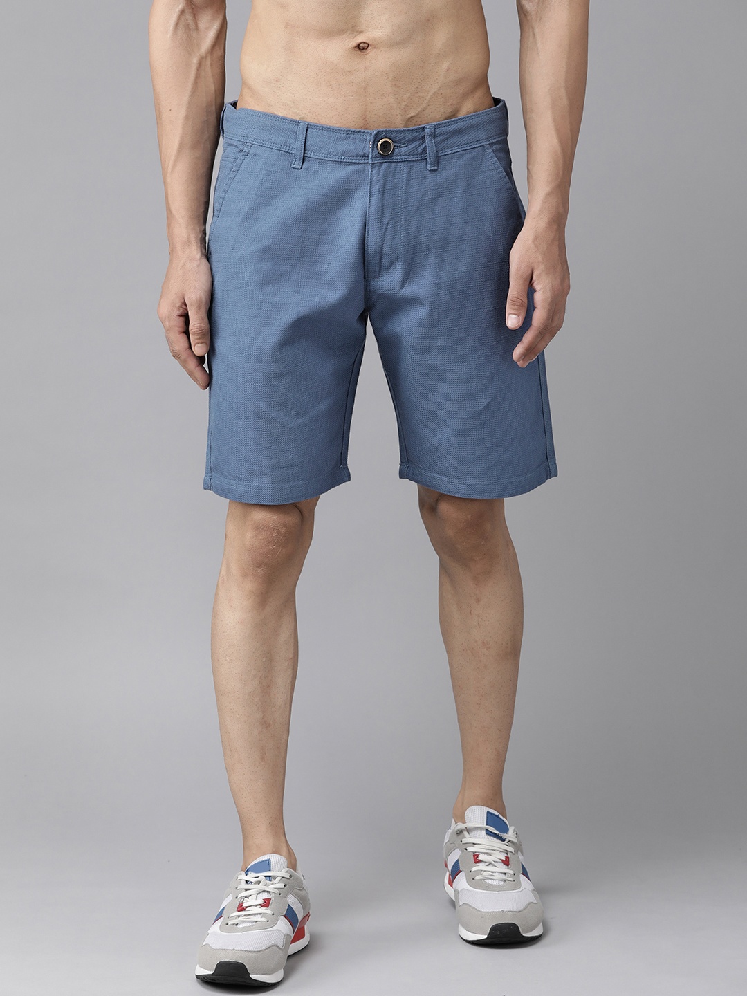 

Roadster Men Blue Solid Cotton Regular Shorts