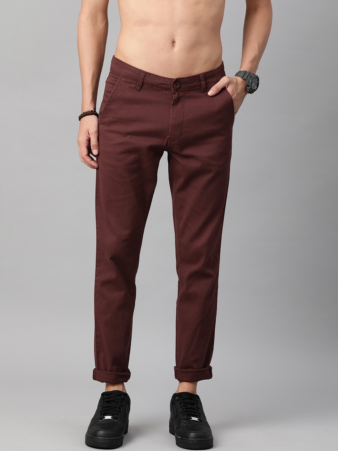 

Roadster Men Burgundy Solid Regular Trousers